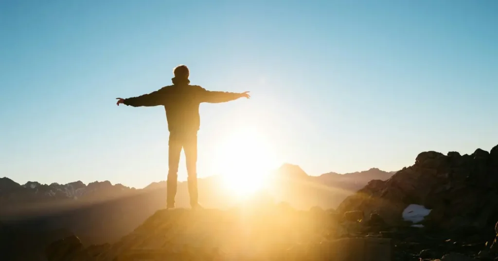 An introverted person standing on hill overcoming social anxiety